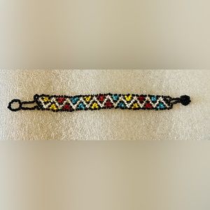 Hand beaded bracelet with vibrant colors and design